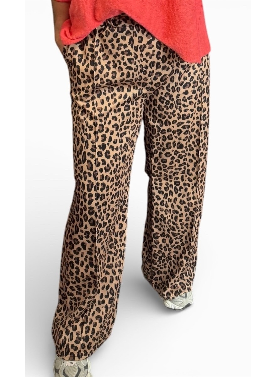 KLEINERE travelstof broek met panterprint Pantera camel